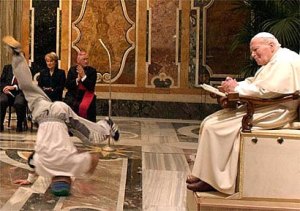Apparently if you search "Pope dancing" in Google, "Pope" is so close to "pole" you get a bunch of images of pole dancers. I don't get it. Here's a pic of JPII watching some breakdancing.